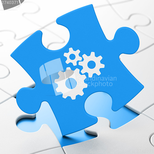 Image of Web design concept: Gears on puzzle background