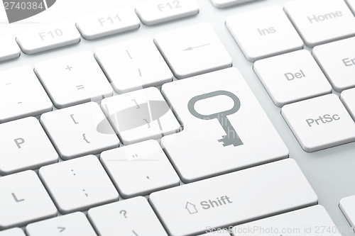 Image of Security concept: Key on computer keyboard background