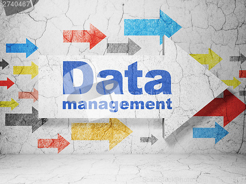 Image of Data concept: arrow Data Management on grunge wall background