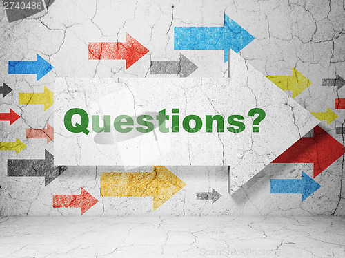 Image of Education concept: arrow whis Questions? on grunge wall