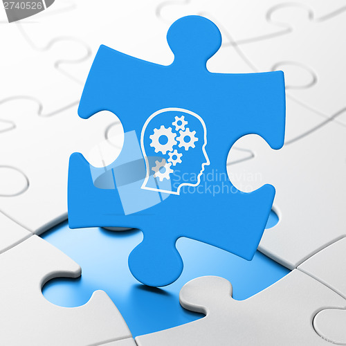 Image of Data concept: Head With Gears on puzzle background