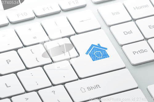 Image of Security concept: Home on computer keyboard background