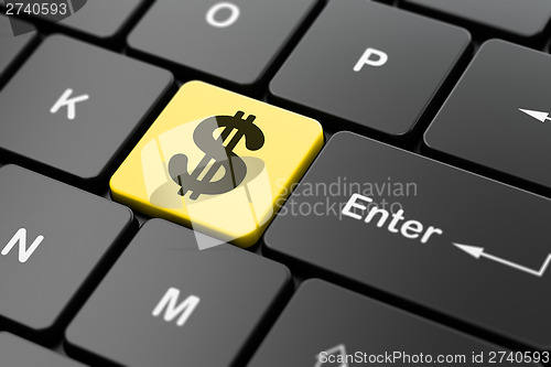 Image of Currency concept: Dollar on computer keyboard background