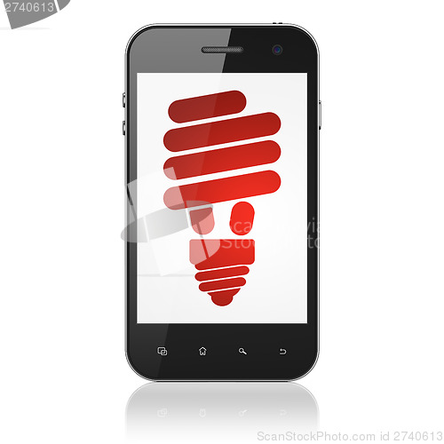 Image of Finance concept: Energy Saving Lamp on smartphone