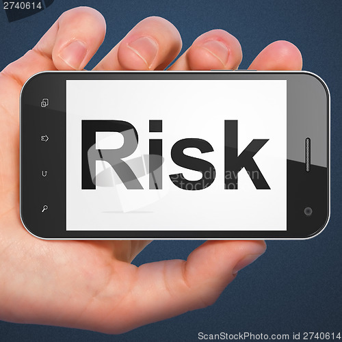 Image of Finance concept: Risk on smartphone