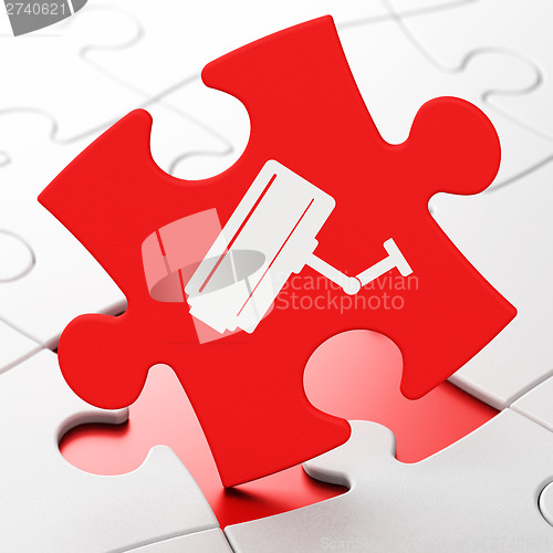 Image of Protection concept: Cctv Camera on puzzle background