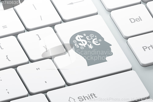 Image of Finance concept: Head With Finance Symbol on keyboard