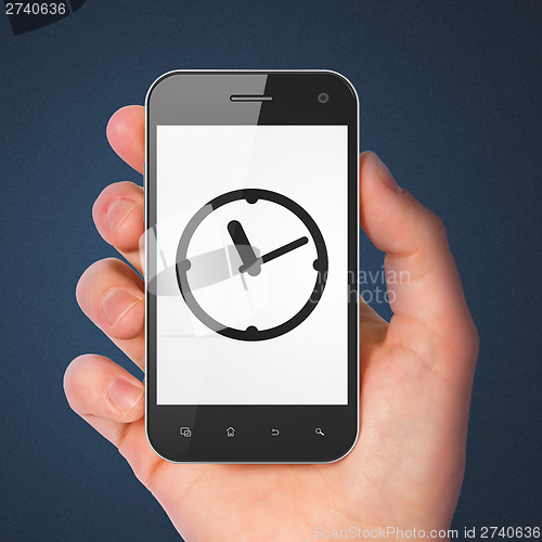 Image of Time concept: Clock on smartphone