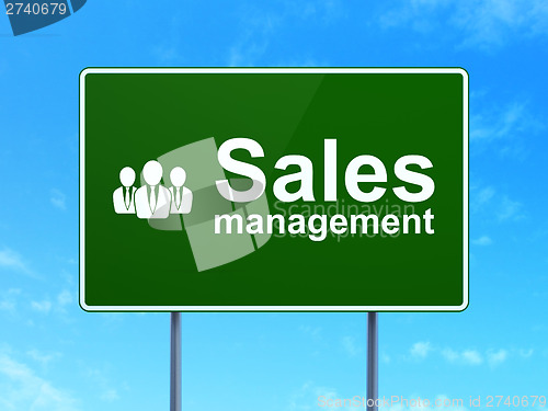 Image of Advertising concept: Management and Business People on road sign