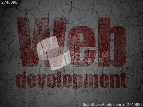 Image of Web Development on grunge wall