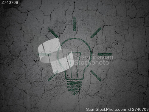 Image of Finance concept: Light Bulb on grunge wall background