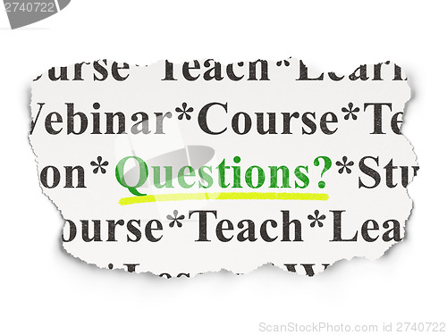 Image of Education concept: Questions? on Paper background