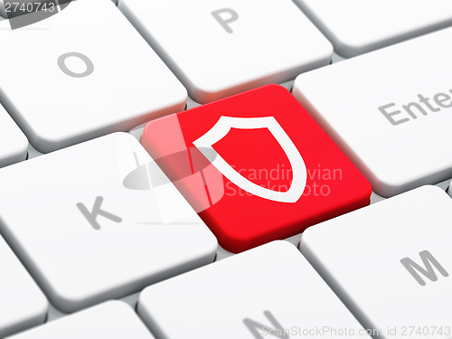 Image of Security concept: Contoured Shield on computer keyboard