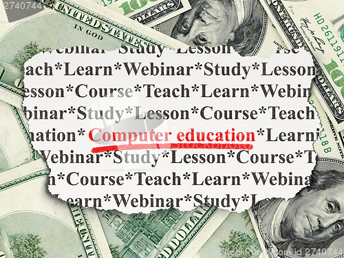 Image of Education concept: Computer on Money background