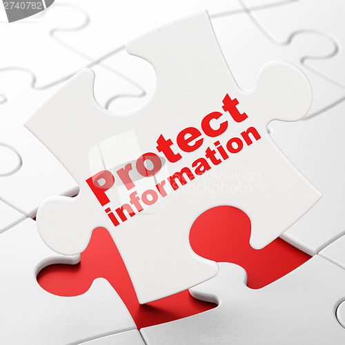 Image of Protection concept: Protect Information on puzzle background