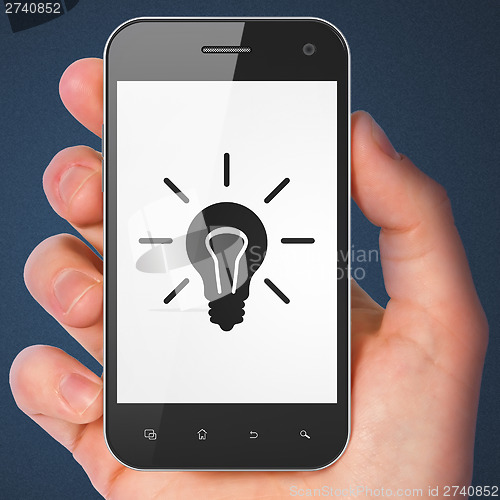 Image of Business concept: Light Bulb on smartphone