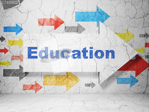 Image of Education concept: arrow whis Education on grunge wall