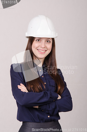 Image of Portrait of a girl engineer in helmet
