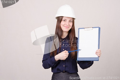 Image of Girl helmet indicates inscription in pencil on a folder