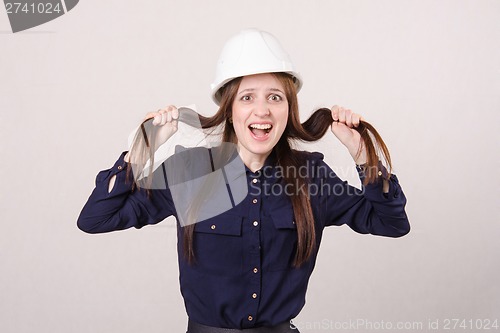 Image of young girl a helmet in shock