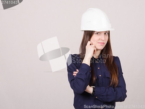 Image of Portrait of pensive girl in a helmet