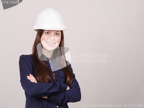 Image of Portrait of confident specialist in helmet