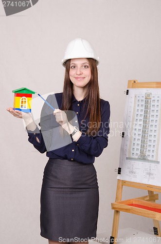 Image of Girl advertises a new multi-storey building