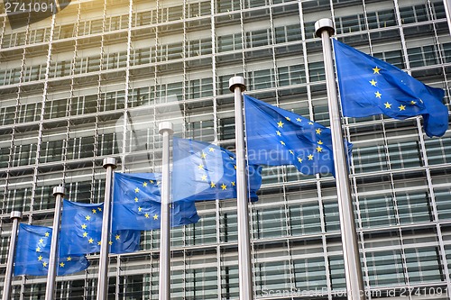 Image of European Union flags in front of the Berlaymont