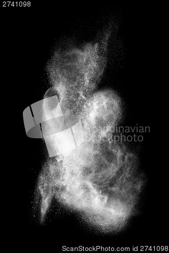 Image of White powder explosion isolated on black