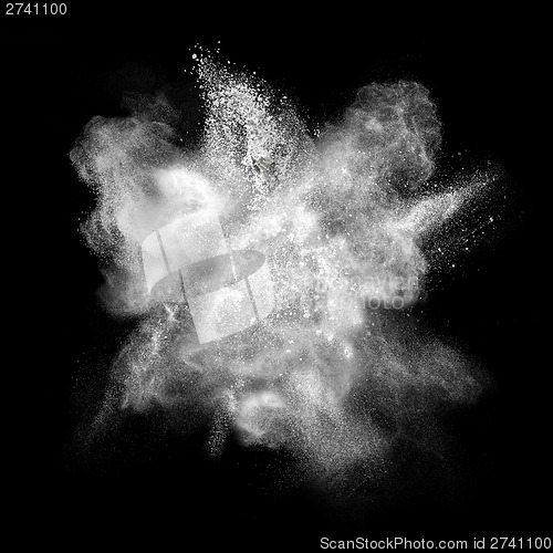 Image of White powder explosion isolated on black