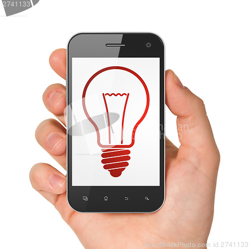 Image of Finance concept: Light Bulb on smartphone