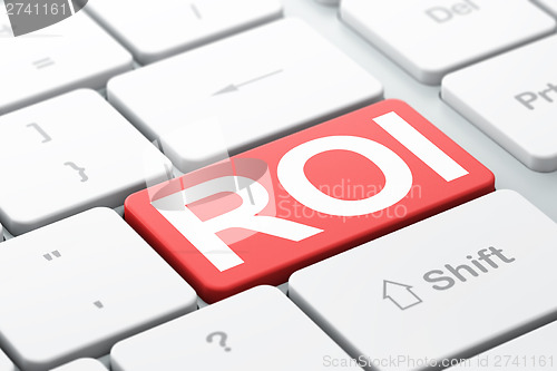 Image of Business concept: ROI on computer keyboard background