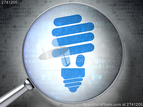 Image of Business concept:  Energy Saving Lamp on digital background