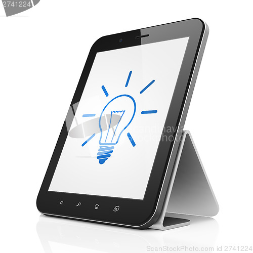 Image of Finance concept: Light Bulb on tablet pc computer