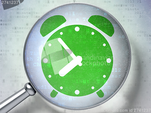 Image of Timeline concept:  Alarm Clock with optical glass on digital bac