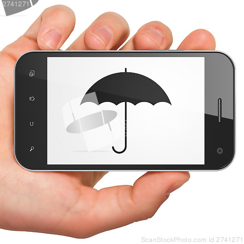 Image of Privacy concept: Umbrella on smartphone