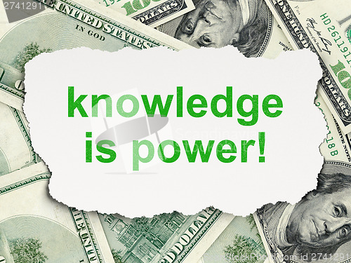 Image of Education concept: Knowledge Is power! on Money background