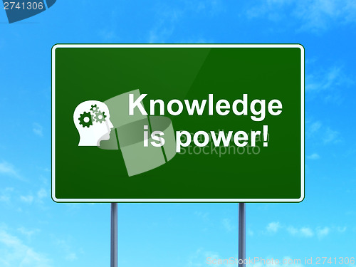 Image of Education concept: Knowledge Is power! and Head road sign