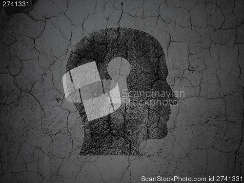 Image of Information concept: Head With Keyhole on grunge wall background