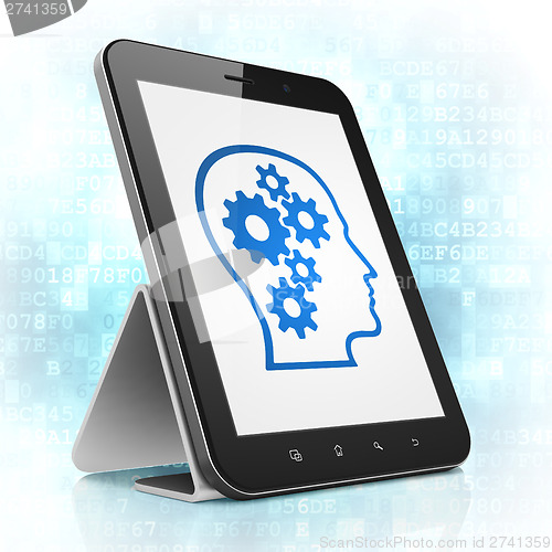 Image of Marketing concept: Head With Gears on tablet pc computer