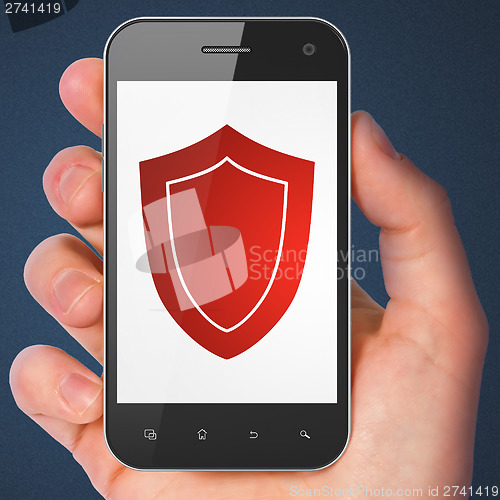Image of Privacy concept: Shield on smartphone