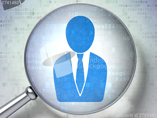 Image of Finance concept:  Business Man with optical glass on digital bac