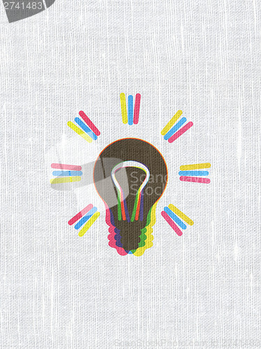 Image of Finance concept: Light Bulb on fabric texture background