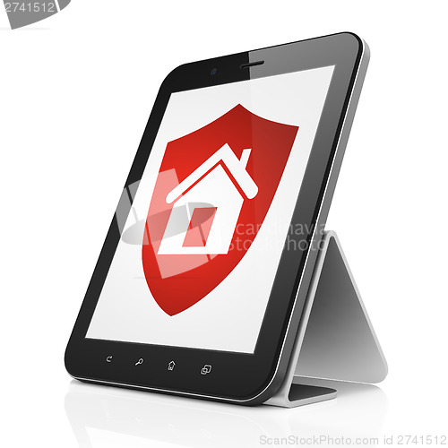 Image of Security concept: Shield on tablet pc computer