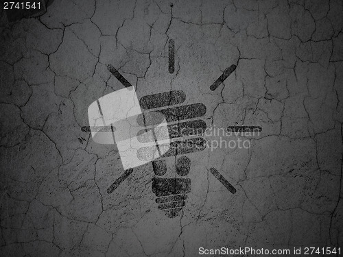Image of Finance concept: Energy Saving Lamp on grunge wall background