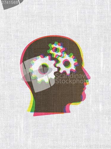 Image of Information concept: Head With Gears on fabric texture backgroun