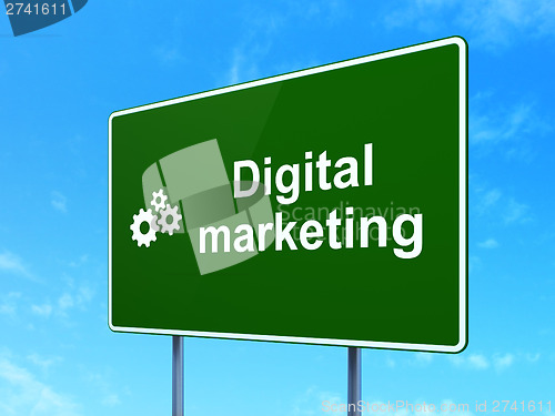 Image of Advertising concept: Digital Marketing and Gears on road sign