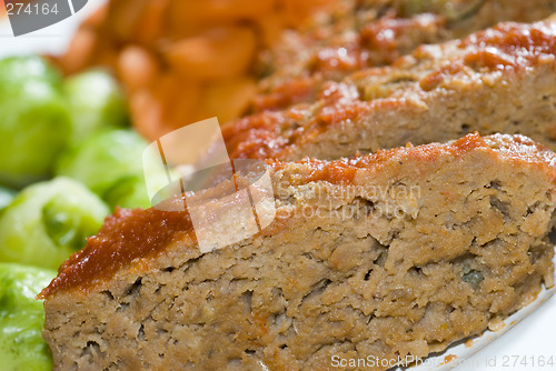 Image of meat loaf with brussels sprouts and carrots