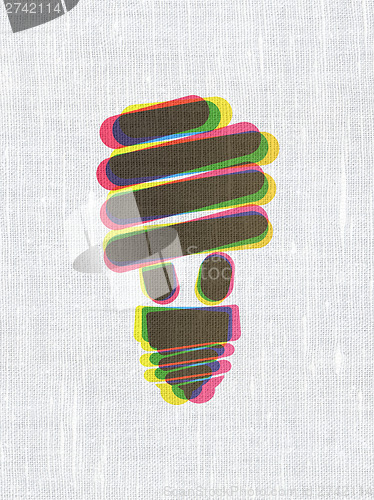 Image of Business concept: Energy Saving Lamp on fabric texture backgroun