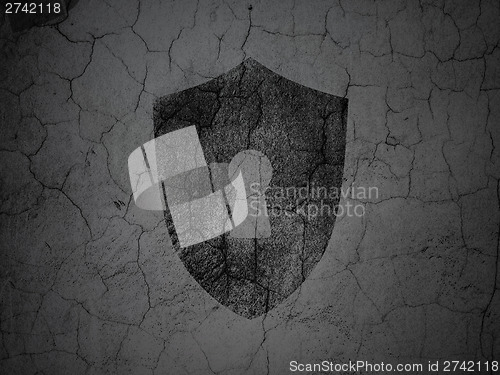 Image of Safety concept: Shield With Keyhole on grunge wall background